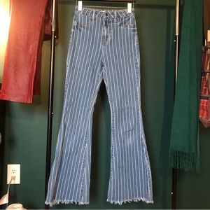 Stretchy striped flare Cello jeans with raw hem